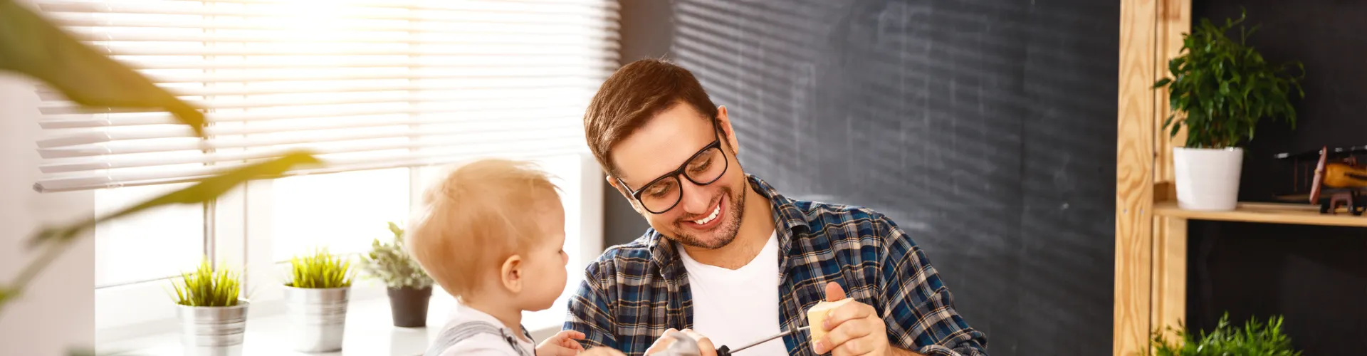 Dad and son playing with blocks