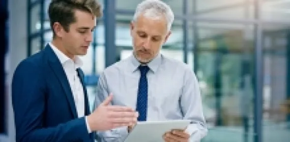 Two businessmen talking
