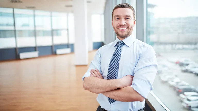 businessman smiling at camera